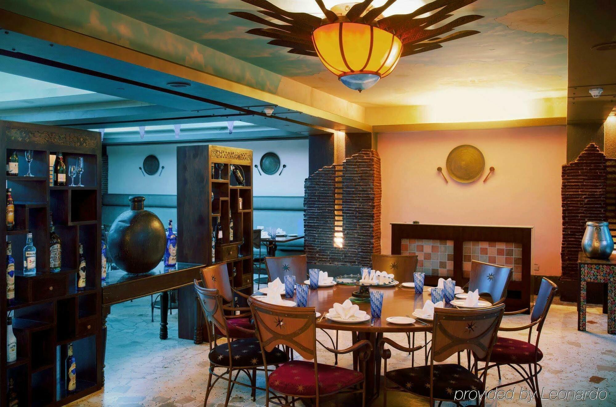 โรงแรมเรดิสัน บลู พูน คาราดี ปูเน่ ภายนอก รูปภาพ The restaurant